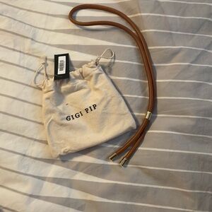 Gigi Pip brown leather hat necklace/charm!